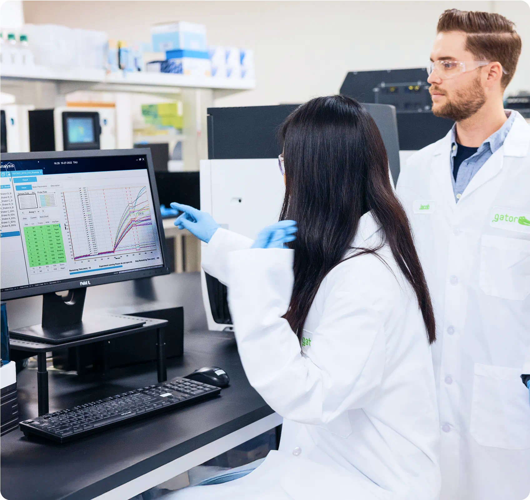 two scientist collaborate in a lab